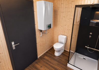 Sanitaire individuel pour camping avec douche, WC et chauffe-eau intégré